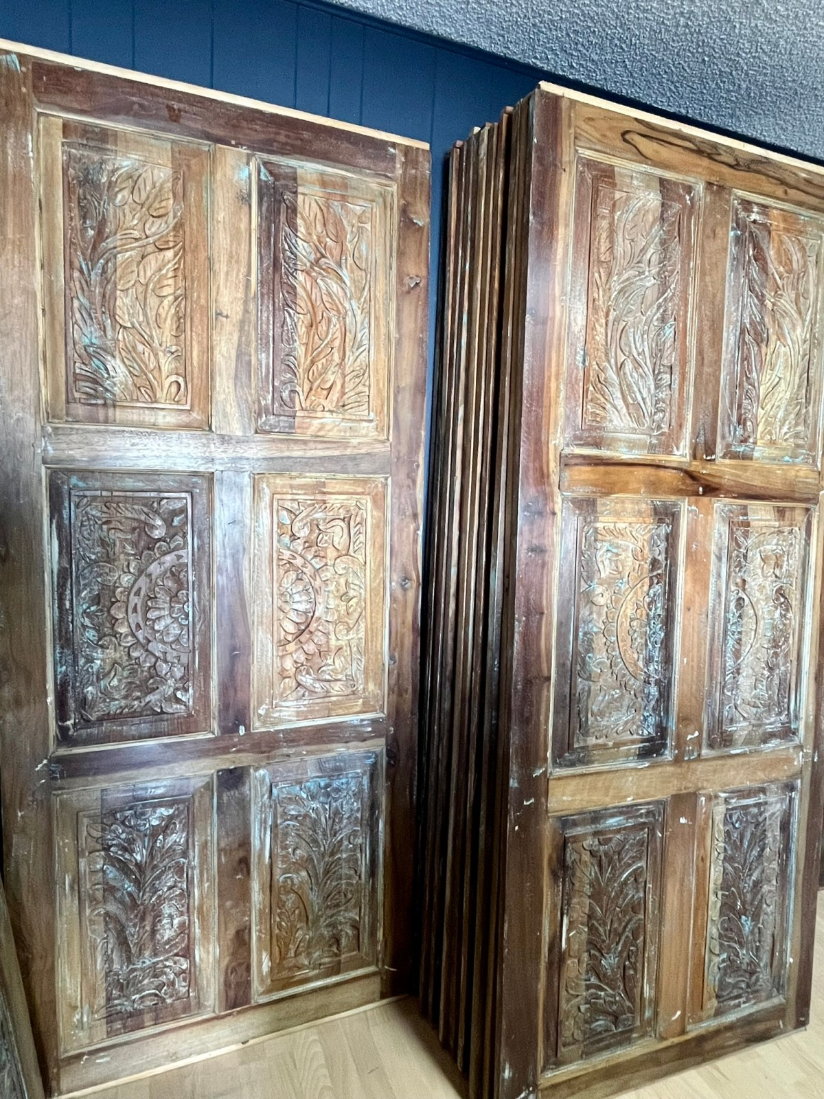 Resort-style themed decor with carved barn doors