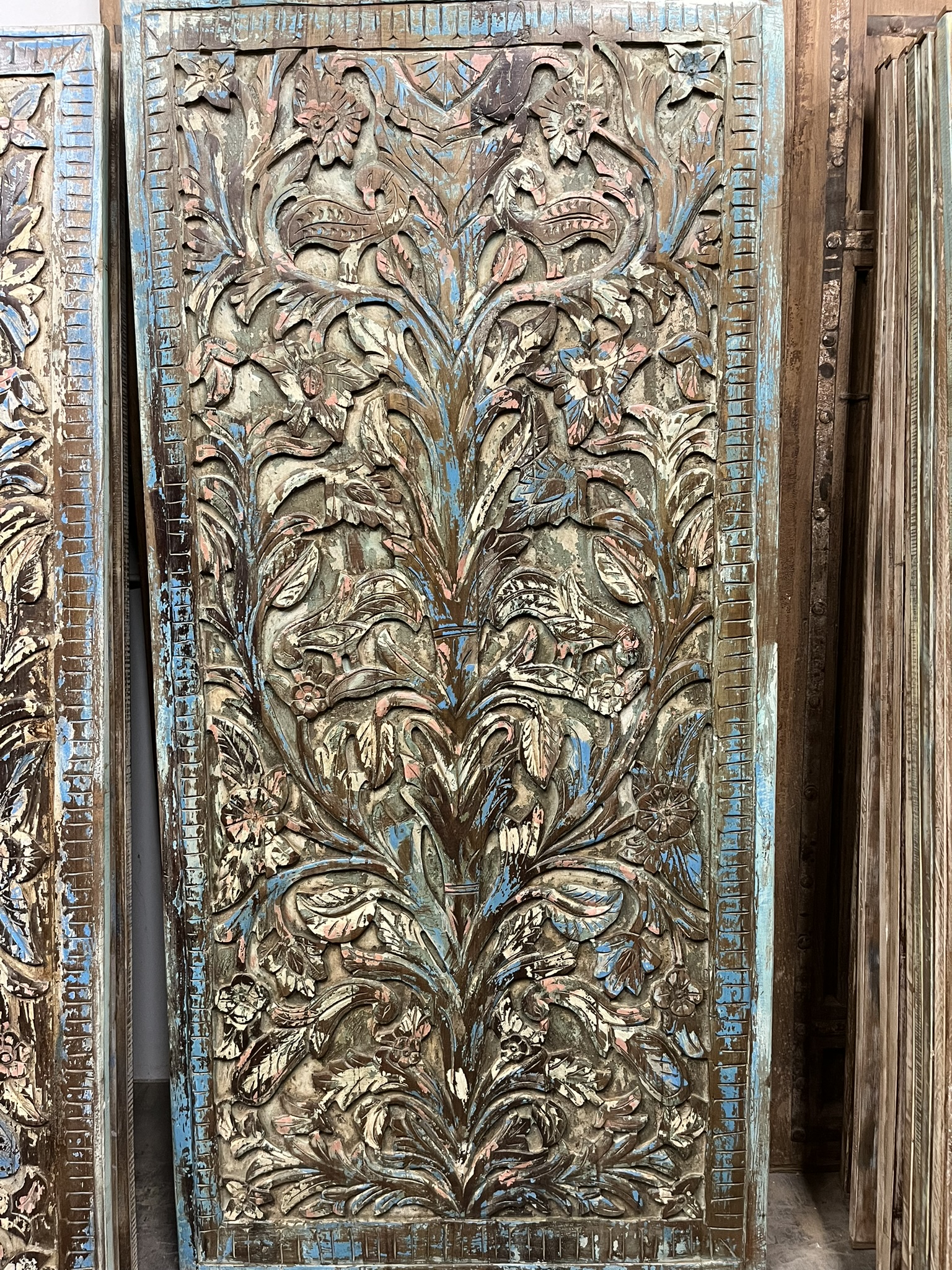 Eclectic Decor with Hand Carved Wood Doors