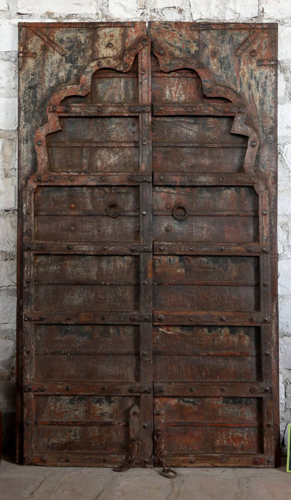 Rustic woodgrain farmhouse cottage with vintage carved barn doors