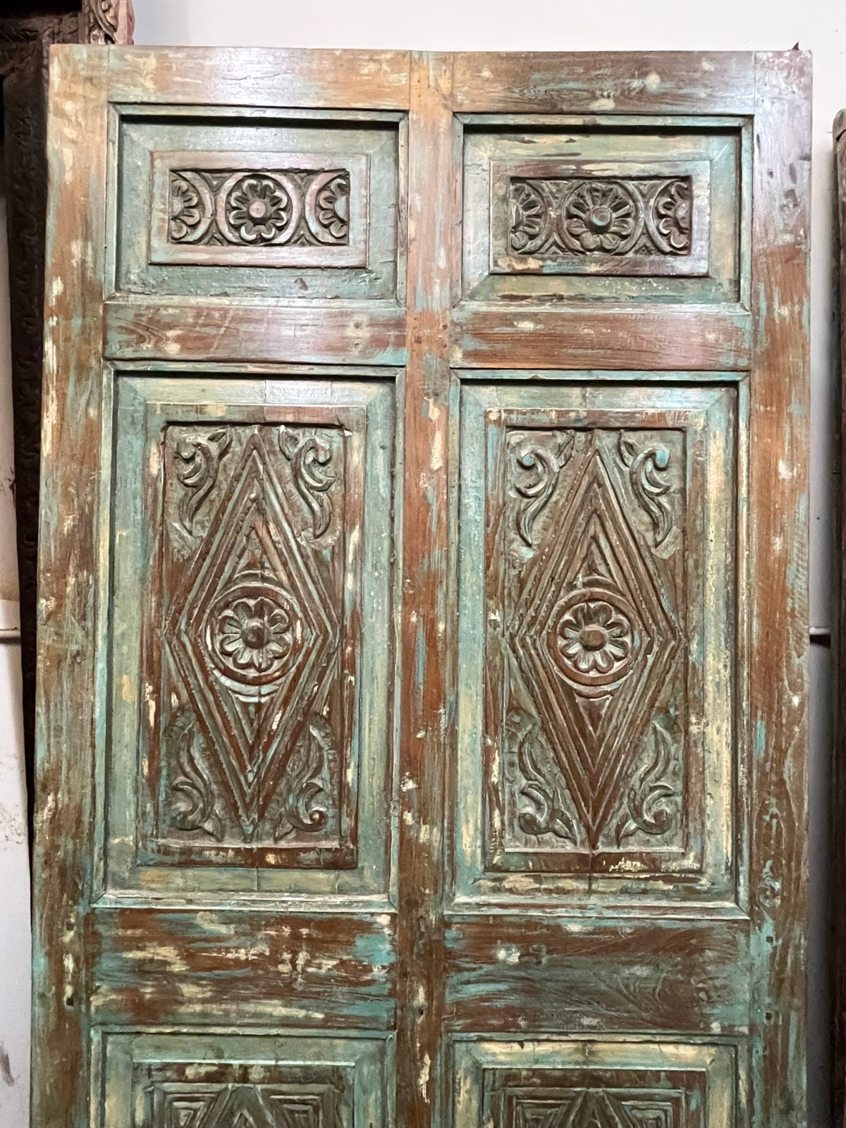 The Beauty Of Vintage Carved Wood Barn Doors