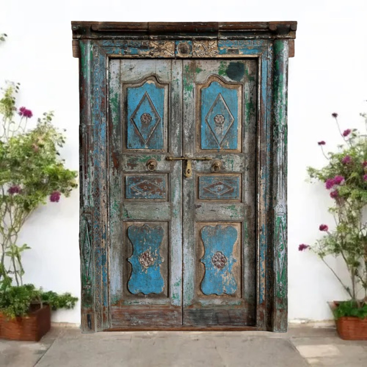 More is More: Moody Blue Carved Doors in Mogul Interior Wellness Decor