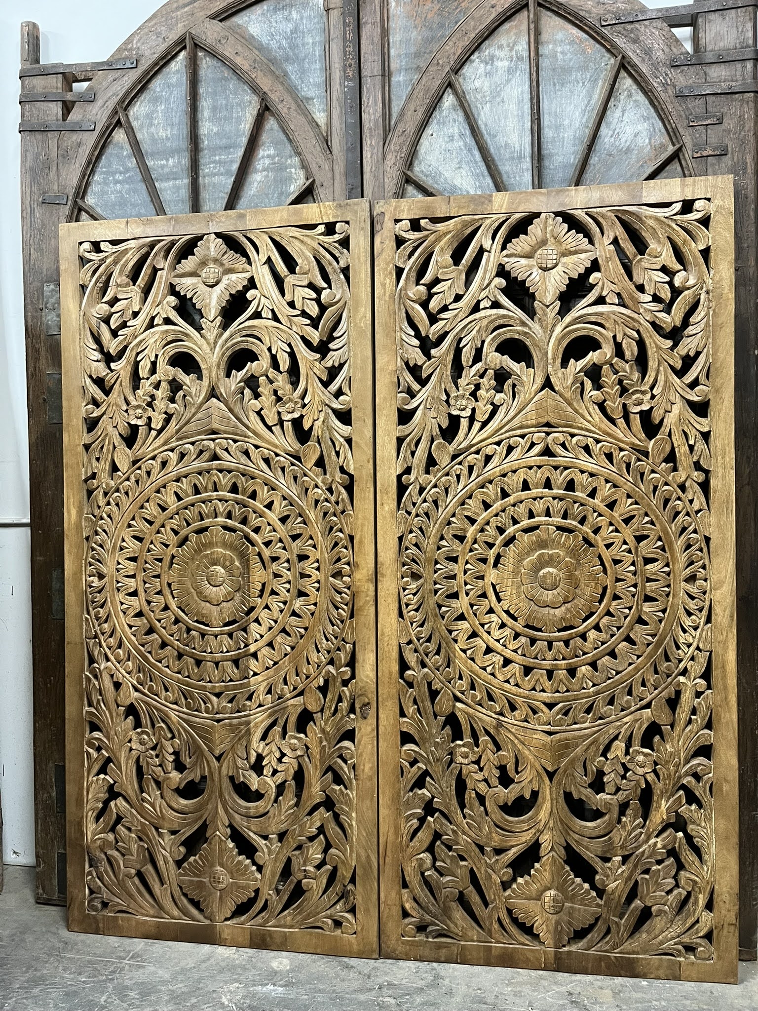 Blending Eclectic Maximalism with Farmhouse Charm: Mogul Interior Nature-Carved Doors