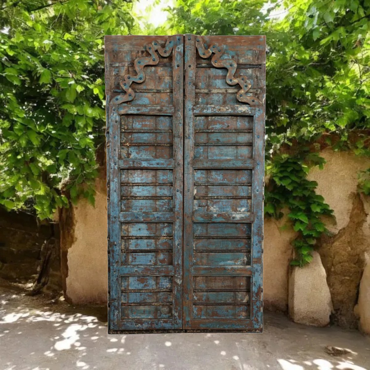 Embrace Nature’s Elements with Hand-Carved Rustic Barn Doors & Antique Furniture